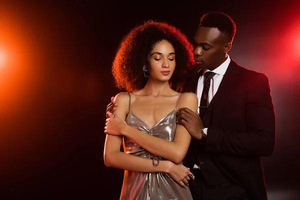 African American Man Suit Embracing Curly Woman Dress Black — Stock Photo, Image