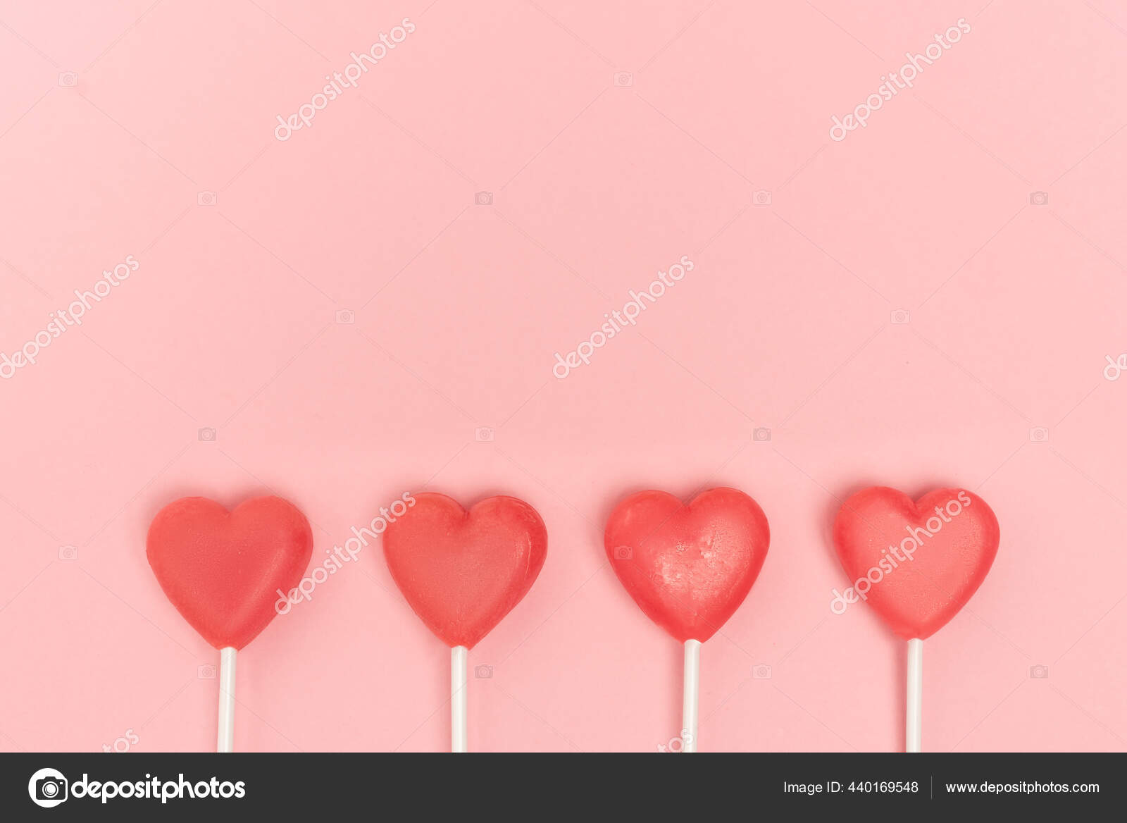 Top View Heart Shaped Lollipops Pink Background Stock Photo by