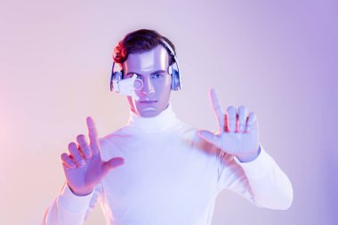 Cyborg in eye lens and headphones using something on purple background clipart