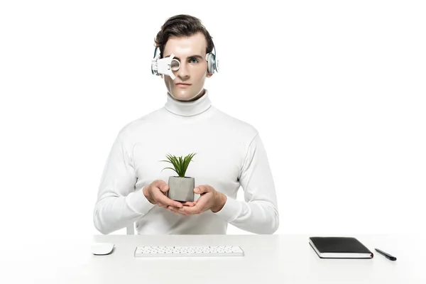 Cyborg Headphones Eye Lens Holding Plant Computer Mouse Keyboard Notebook — Stock Photo, Image