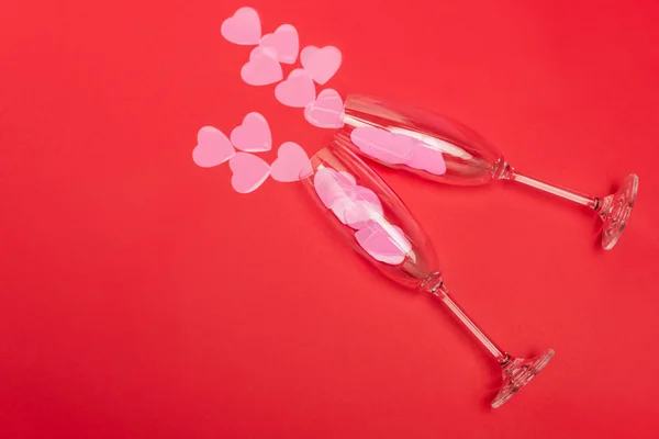 Top View Pink Hearts Champagne Glasses Red Background — Stock Photo, Image