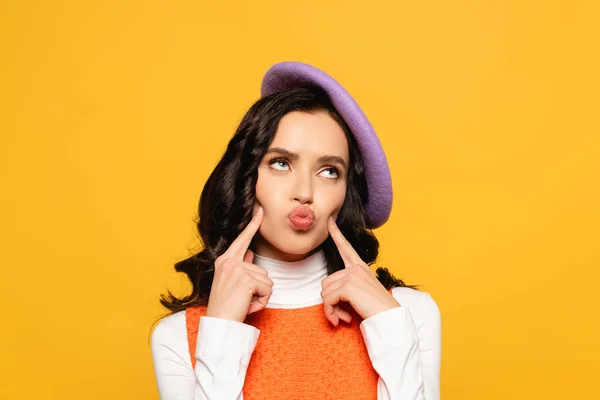 Stylish Brunette Woman Pouting Lips Wearing Beret Looking Isolated Yellow — Stock Photo, Image