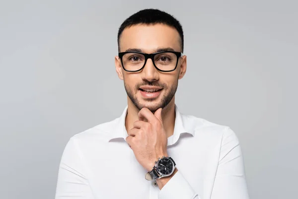 Happy Hispanic Businessman Touching Chin While Smiling Camera Isolated Grey — Stock Photo, Image