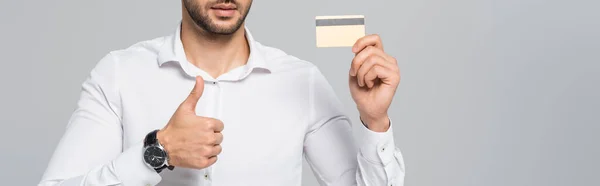 Cropped View Manager Credit Card Showing Thumb Isolated Grey Banner — Stock Photo, Image