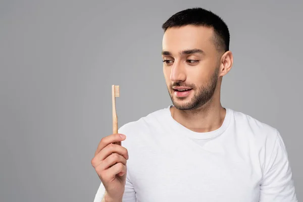 Young Bearded Hispanic Man Holding Toothbrush Isolated Grey — Stock Photo, Image