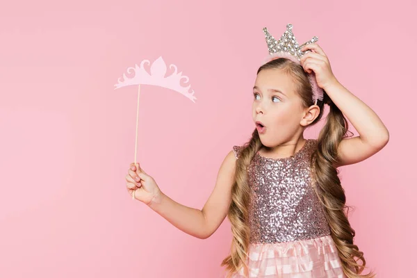 Shocked Little Girl Dress Holding Paper Crown Stick Isolated Pink — Stock Photo, Image