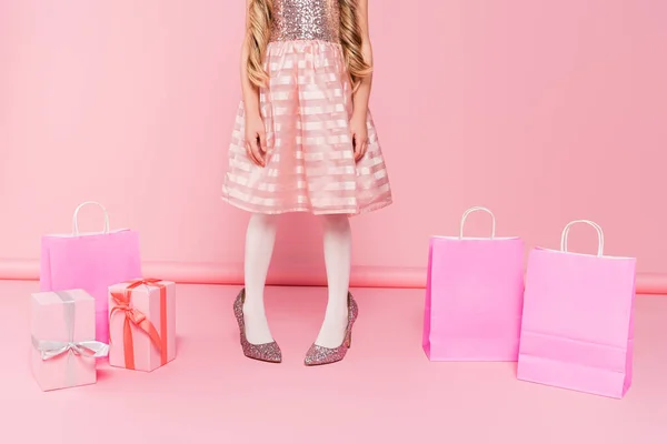 Cropped View Little Girl Dress Standing Heels Presents Shopping Bags — Stock Photo, Image