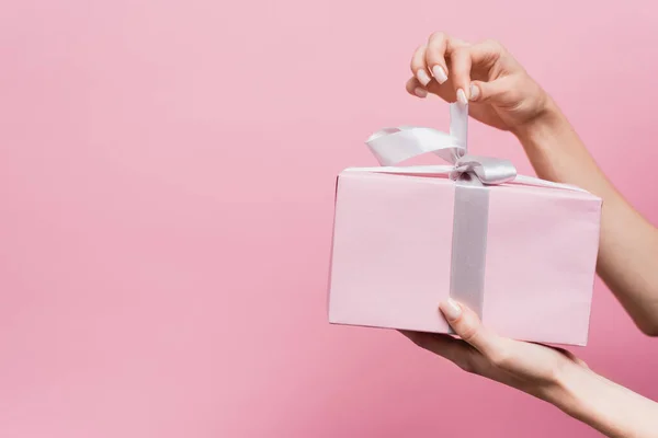 Partial View Woman Holding Ribbon Wrapped Present Isolated Pink — Stock Photo, Image