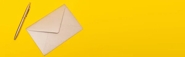 Top View Envelope Golden Pen Isolated Yellow Banner — Stock Photo, Image