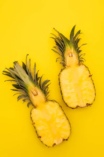 Top View Halves Ripe Sweet Pineapples Isolated Yellow — Stock Photo, Image
