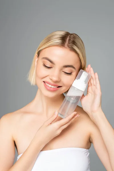 Smiling Woman Perfect Skin Holding Bottle Cleansing Foam Isolated Grey — Stock Photo, Image