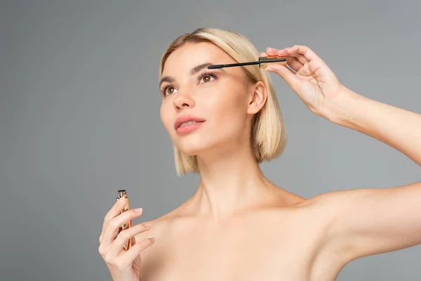 Low Angle View Blonde Woman Holding Mascara Isolated Grey — Stock Photo, Image