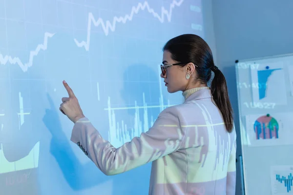 Businesswoman Glasses Pointing Finger Digital Graphs — Stock Photo, Image