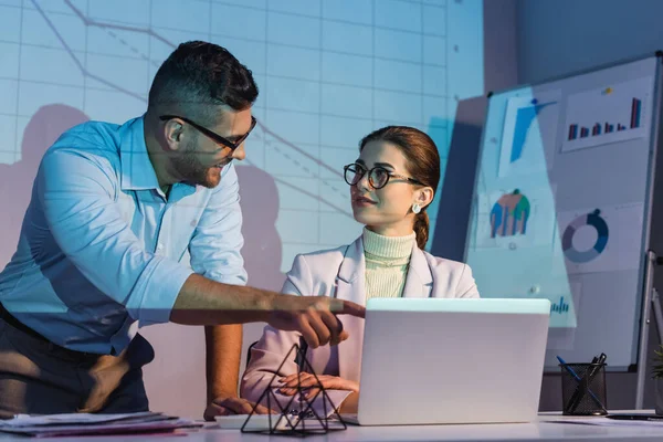 Happy Businessman Pointing Finger Laptop Looking Coworker Glasses — Stock Photo, Image