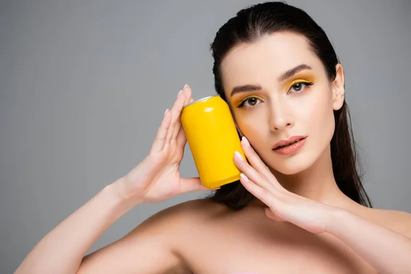 Brunette Young Woman Holding Yellow Can Soft Drink Isolated Grey — Stock Photo, Image