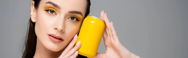 Brunette Young Woman Holding Yellow Can Soft Drink Isolated Grey — Stock Photo, Image