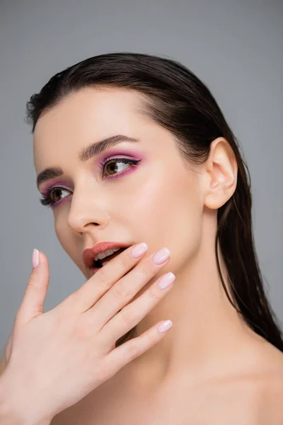 Young Woman Pink Eye Shadows Bare Shoulders Touching Lips Isolated — Stock Photo, Image