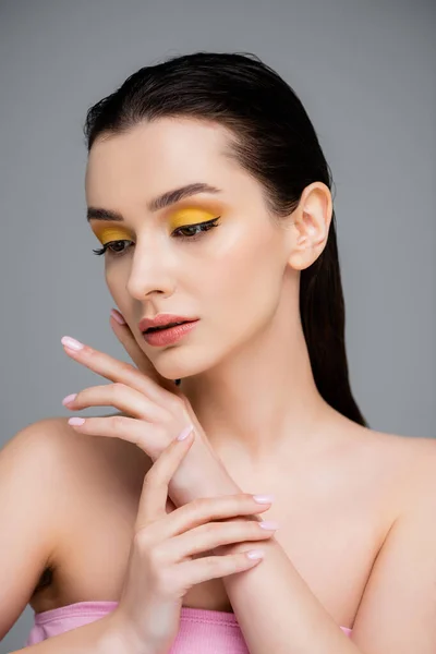 Young Brunette Woman Yellow Makeup Looking Away Isolated Grey — Stock Photo, Image