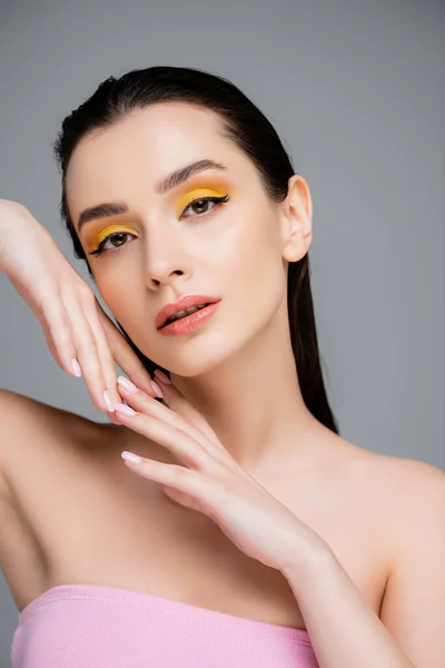 Young Brunette Woman Yellow Makeup Looking Camera Isolated Grey — Stock Photo, Image