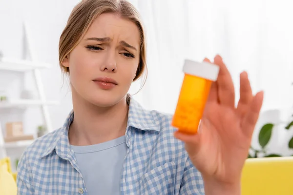 Sad Woman Allergy Holding Jar Pills Blurred Foreground — Stock Photo, Image