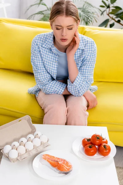 Salmon Eggs Tomatoes Woman Allergy Couch — Fotografia de Stock