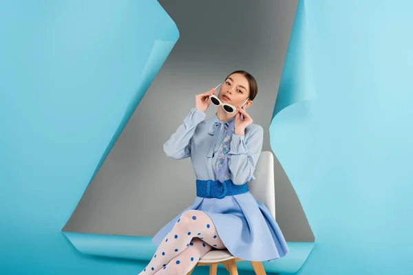 Glamour Woman Taking Sunglasses While Sitting Hole Blue Paper Grey — Stock Photo, Image