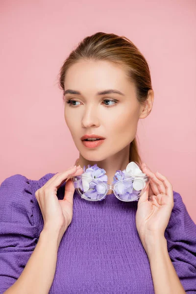 Charming Woman Purple Blouse Holding Eyeglasses Floral Petals Isolated Pink — Stock Photo, Image