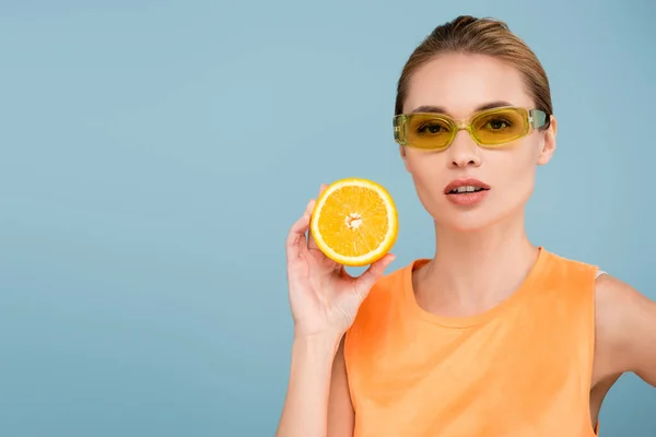 Charming Woman Colored Eyeglasses Posing Half Ripe Orange Isolated Blue — Stock Photo, Image