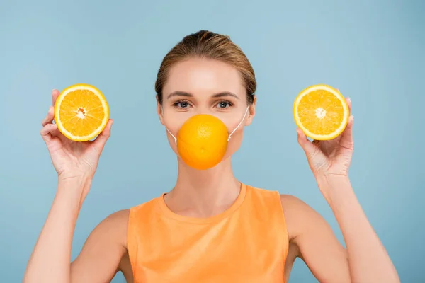 Young Woman Protection Mask Made Orange Looking Camera Isolated Blue — Stock Photo, Image