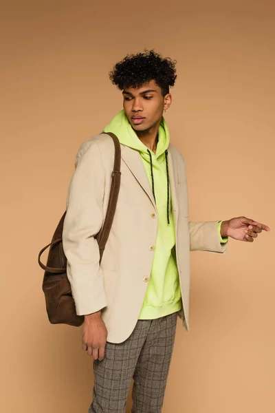 Trendy African American Man Hoodie Blazer Standing Leather Bag Beige — Stock Photo, Image