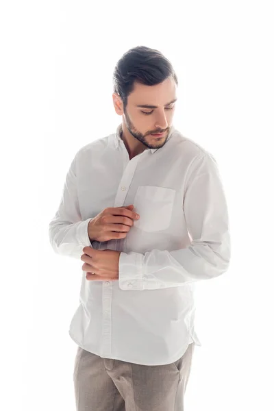 Young Man Fixing Sleeve White Shirt Isolated White — Stock Photo, Image