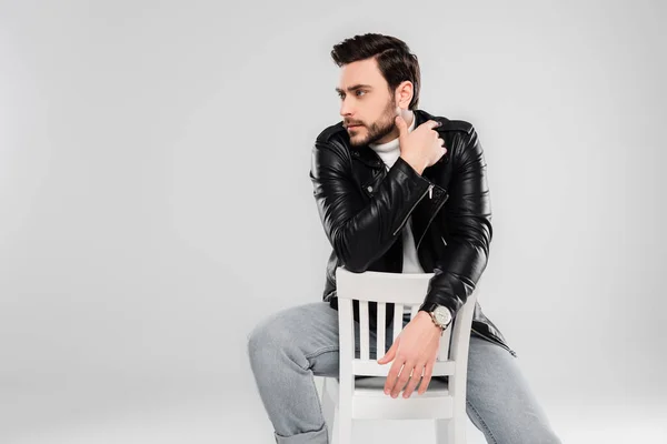 Stylish Man Sitting White Chair Isolated Grey — Stock Photo, Image