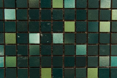 dark background with small, multicolored stone tiles, top view clipart