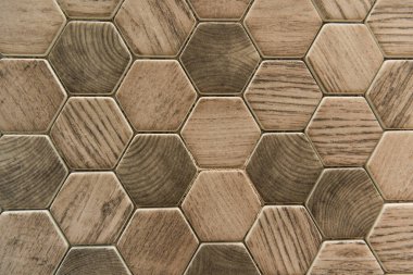 background with hexagon ceramic tiles, with wood imitation, top view clipart