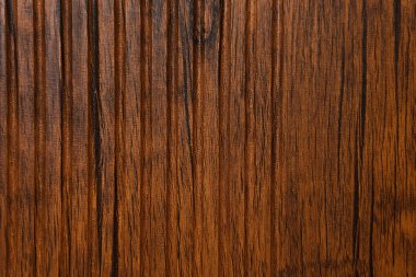 background of brown, laminated plastic, with wood imitation, top view clipart