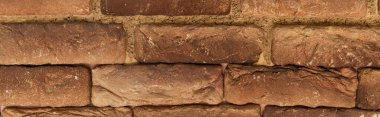 Tuğla terracotta duvarının arka planı, üst görünüm, afiş