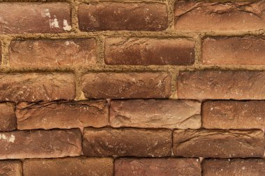 Doğal terracotta tuğlalarından yapılmış duvarın arka planı, üst görünüm