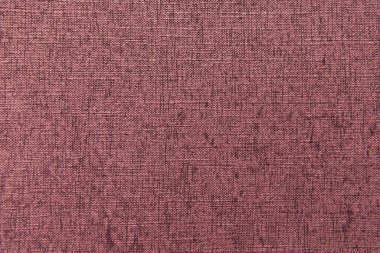 Koyu pembe, desenli yüzeyin arka planı, çuval taklidi, üst görünüm