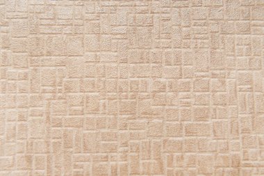 beige wallpaper with embossed geometric pattern, top view clipart