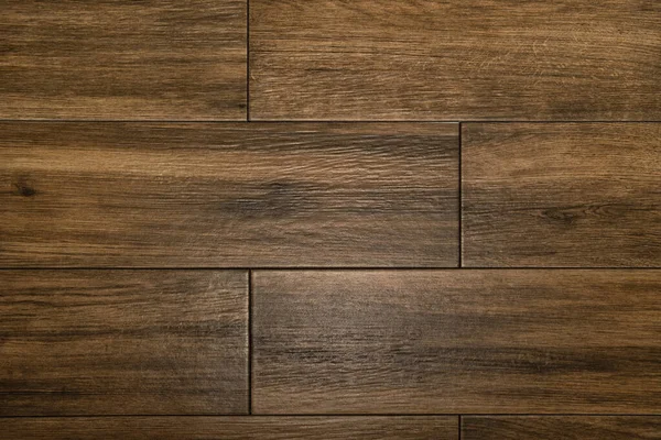 茶色の木製の床の背景トップビュー — ストック写真