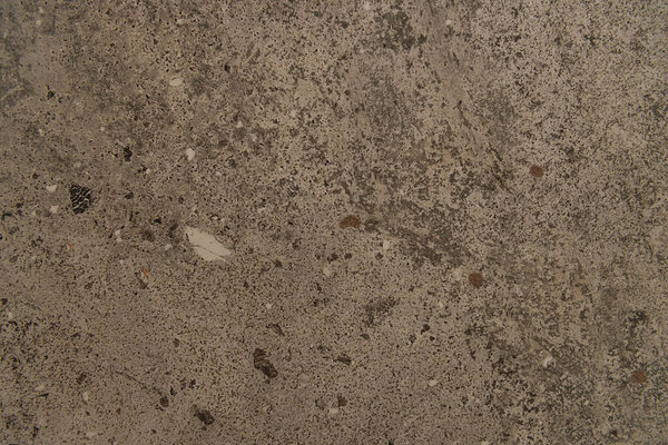 grey, polished stone textured background, top view