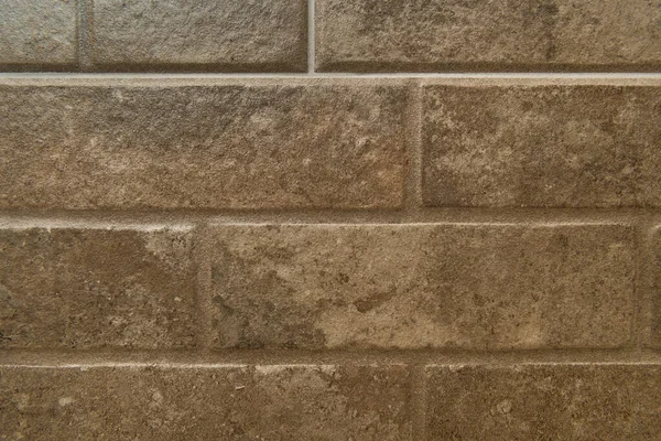 background of brown brick wall, top view