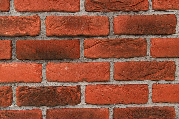 background of natural terracotta brick wall, top view