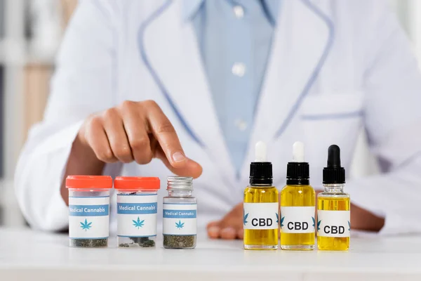 Cropped View Doctor Pointing Finger Bottles Legal Cbd Medical Cannabis — Stock Photo, Image