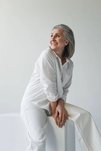 Positive Woman Smiling Away Cube Isolated Grey — Stock Photo, Image