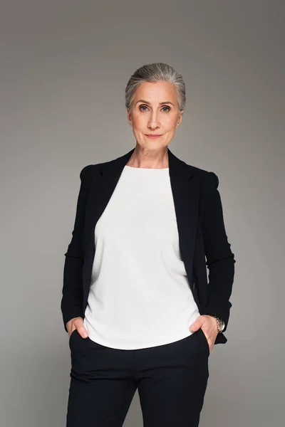 Grey Haired Businesswoman Looking Camera Isolated Grey — Stock Photo, Image