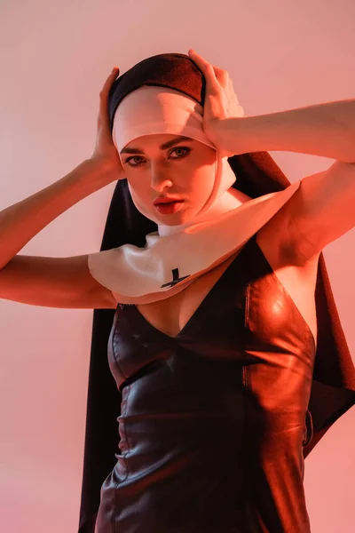 Young Nun Sexy Dress Looking Camera While Touching Head Isolated — Stock Photo, Image