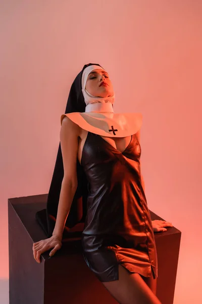 Sensual Nun Sexy Dress Posing Closed Eyes Black Cube Pink — Stock Photo, Image
