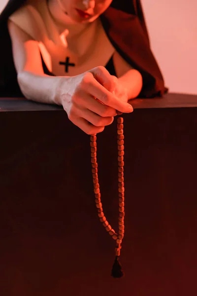 Partial View Nun Holding Rosary Isolated Pink Blurred Background — Stock Photo, Image