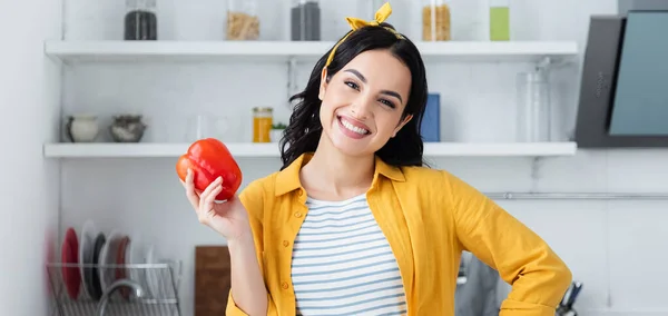 Smiling Brunette Woman Holding Red Bell Pepper Banner — Stock Photo, Image